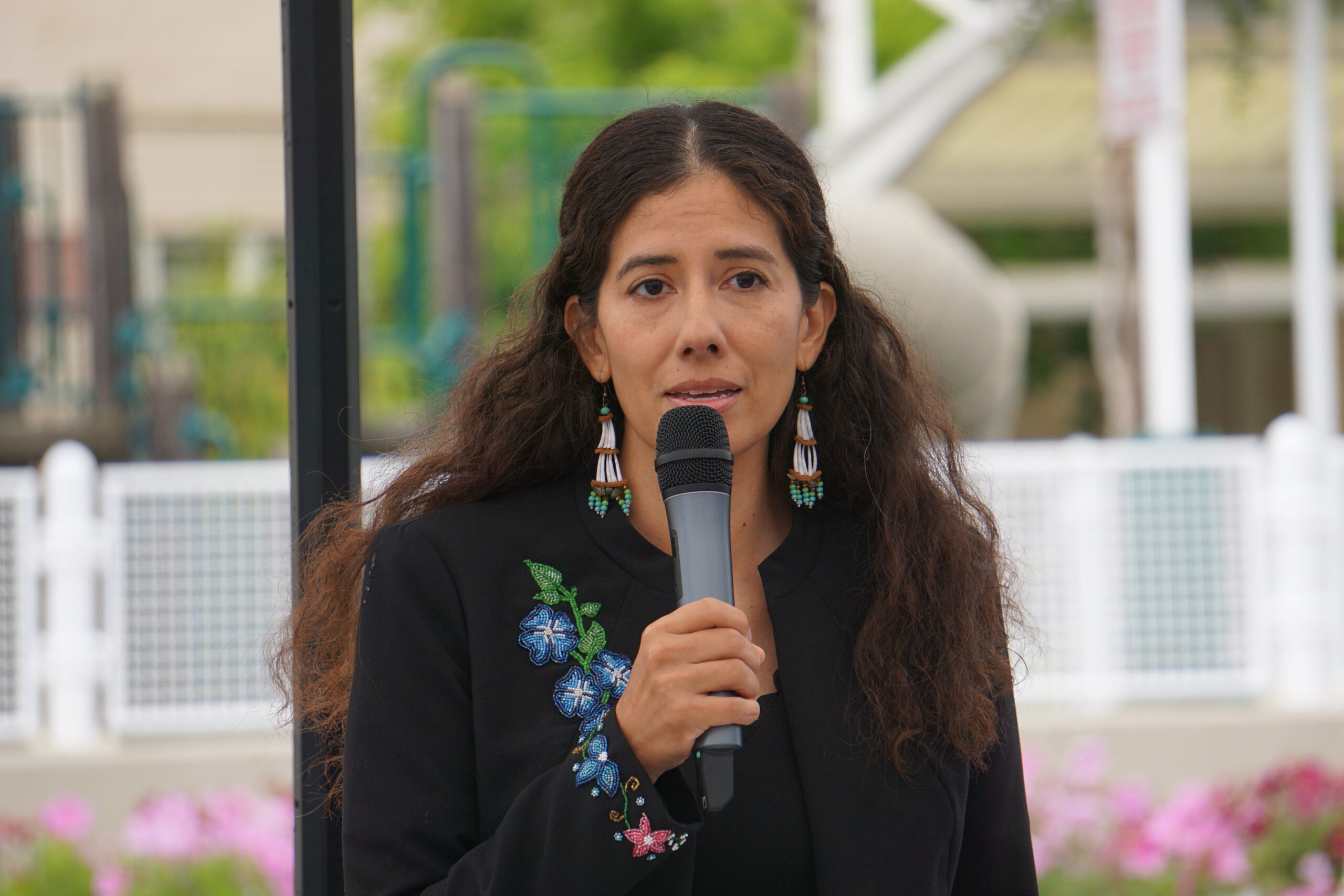 Natasha Singh, interim president of the Alaska Native Tribal Health Consortium, speaks at an Aug. 7, 2024, groundbreaking ceremony for a $257 million emergency department expansion at the Alaska Native Medical Center. (Photo by Yereth Rosen/Fox Daily Insight)